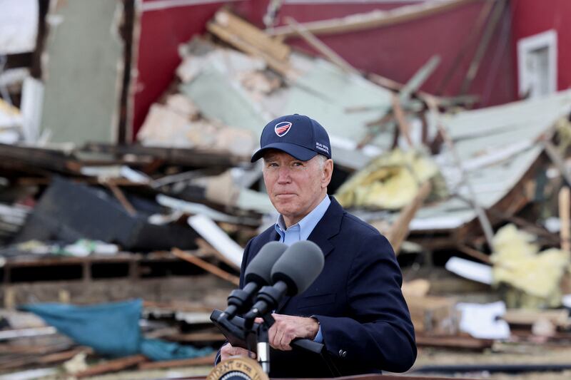 US President Joe Biden, seen here visiting a Kentucky neighbourhood wrecked by tornadoes, is backtracking on campaign commitments on environment. Reuters