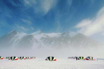 Clam tents in the guest accommodation area, at Union Glacier Camp, on a foggy day