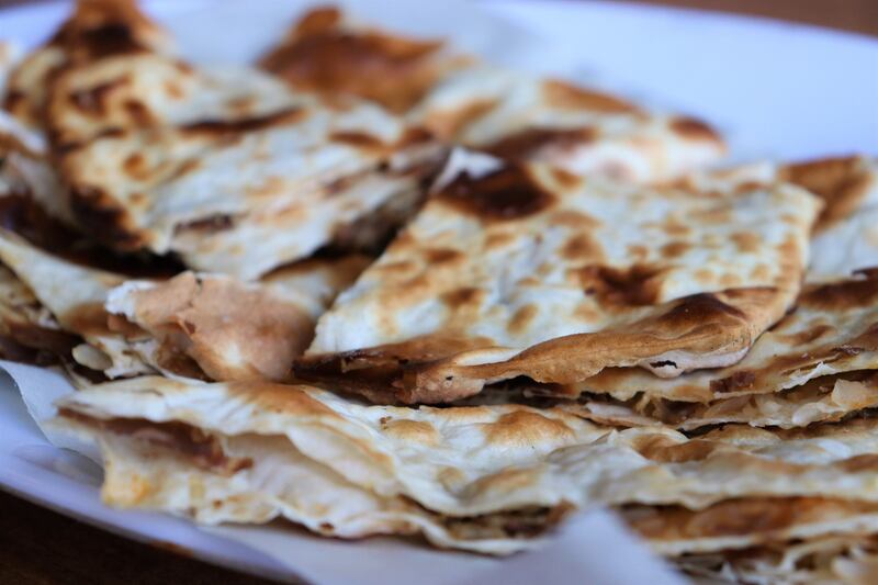 Locals take their pastirma to bakeries to be baked into flatbreads. Photo: Maghie Ghali