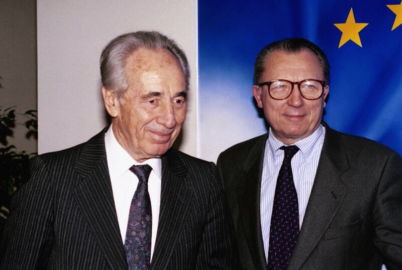 Israeli Foreign Minister Shimon Peres and Mr Delors in Brussels on November 25, 1993. AP