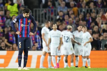 FC Barcelona's Gerard Pique (L) reacts during the UEFA Champions League Group C soccer match between FC Barcelona and FC Internazionale Milano, in Barcelona, eastern Spain, 12 October 2022.   EPA / Siu Wu