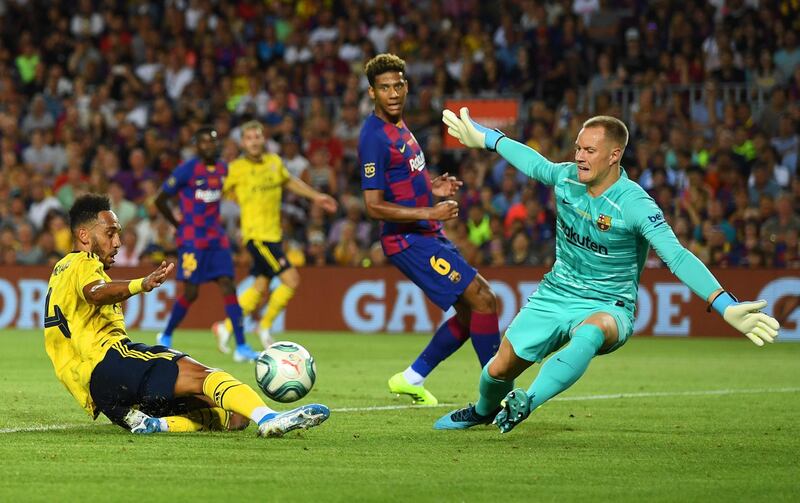 Arsenal's Pierre-Emerick Aubameyang misses a chance as Marc-Andre Ter Stegen stands tall. Getty