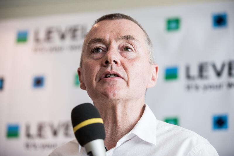 Willie Walsh, chief executive officer of International Consolidated Airlines Group SA (IAG), speaks during a news conference to launch the Austrian base for low-cost brand Level, operated by International Consolidated Airlines Group SA (IAG), at Vienna International Airport in Vienna, Austria, on Tuesday, July 17, 2018. The Level brand has sold over 150,000 seats since launch, Walsh told reporters in Vienna. Photographer: Akos Stiller/Bloomberg