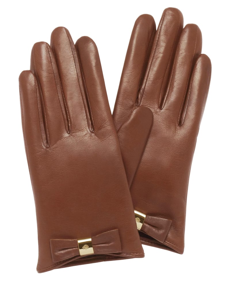 A handout photo of Mulberry Bow Glove Chestnut Nappa (Courtesy: Mulberry) *** Local Caption ***  UT28NO-ACCESSORIES06.jpg