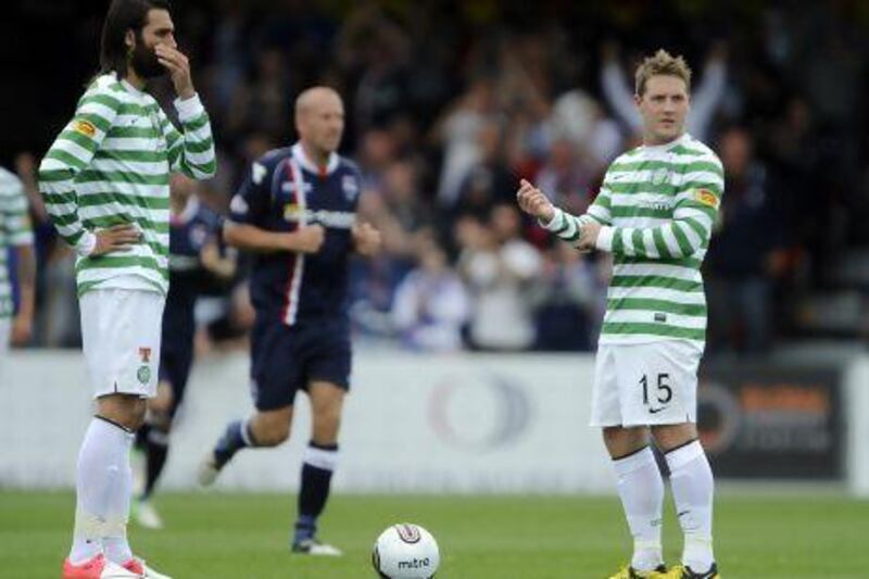Celtic, above with Georgios Samaras, left, and Kris Commons, are not running away in the Scottish Premier League as many expected after Glasgow Rangers' relegation to the Third Division. Russell Cheyne / Reuters