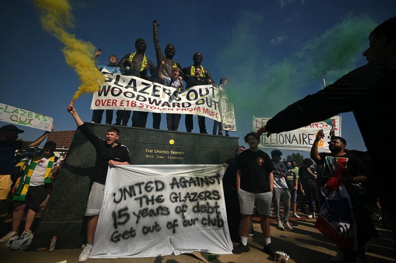 Supporters protest against Manchester United's owners outside Old Trafford stadium. AFP