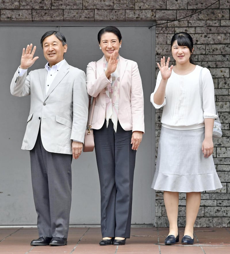 Japan's Crown Prince Naruhito (L), his wife Crown Princess Masako (C) and daughter Princess Aiko wave in front of JR Utsunomiya station on their way to Imperial Stock Farm in Tochigi Prefecture on May 3, 2018. (Pool photo)(Kyodo)
==Kyodo
(Photo by Kyodo News via Getty Images)