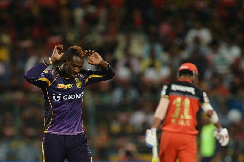Kolkata Knight Riders bowler Andre Russell (L) gestures after a ball during the 2016 Indian Premier League (IPL) Twenty20 cricket match between Royal Challengers Bangalore and Kolkata Knight Riders, at The M Chinnaswamy Stadium in Bangalore on May 2, 2016. AFP / MANJUNATH KIRAN