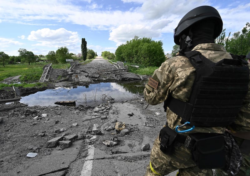 A bridge is a destroyed near Rus'ka Lozova, north of Kharkiv. AFP