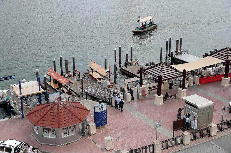 DUBAI, UNITED ARAB EMIRATES , March 24 – 2020 :- View of the quiet Deira old souk abra station as people are staying home as a preventive measure against coronavirus in Deira Dubai. (Pawan Singh / The National) For News/Online/Standalone.