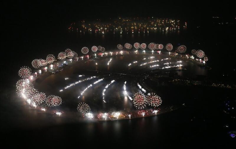 More than 100,000 fireworks were set up on the crescent of the Palm Jumeirah as part of Dubai’s bid to break the world record for the largest display. Karim Sahib / AFP Photo