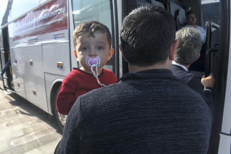  A one hundred and forty three Syrian refugees volunteered to return their homelands Jarablus,Damascus,Aleppo,A'zaz,Al Bab,Afrin load their belongings to trunks of the buses and wait for departure from Istanbul in Esenyurt Municipality garden.          EMRAH GUREL
