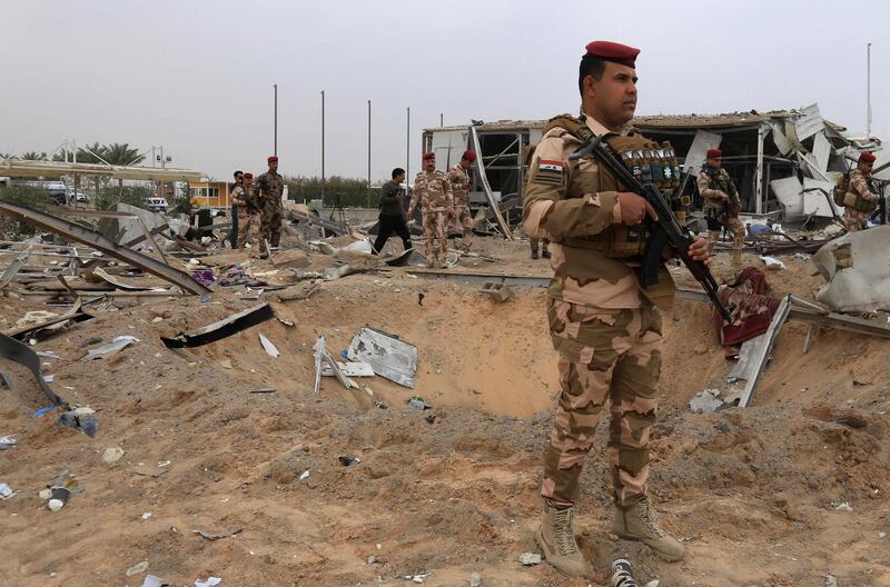 A picture taken on March 13, 2020 shows destruction at Karbala airport in the Iraqi shrine city, one of the areas targeted by US military air strikes against a pro-Iranian group in Iraq following the deaths of two Americans and a Briton in a rocket attack the previous night on a US base in Taji. The US operation targeted five weapons facilities of the Kataeb Hezbollah armed faction across Iraq, the Pentagon said in a statement, one of them in Karbala, south of Baghdad. Wednesday's attack on the Taji air base was the 22nd on US installations in Iraq, including the American embassy, since late October. While there was no immediate claim of responsibility, Washington has blamed Iran-backed factions from the Hashed al-Shaabi network, a state-sponsored umbrella group that includes Kataeb Hezbollah, for recent similar violence.
 / AFP / Mohammed SAWAF
