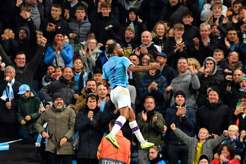 Raheem Sterling celebrates after completing his hat-trick. AFP