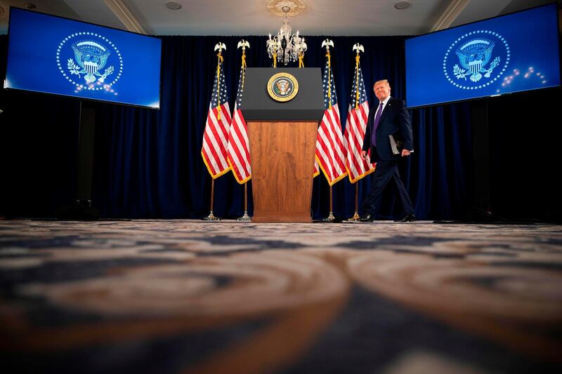 US President Donald Trump arrives to speak at a press conference in Bedminster, New Jersey.  AFP