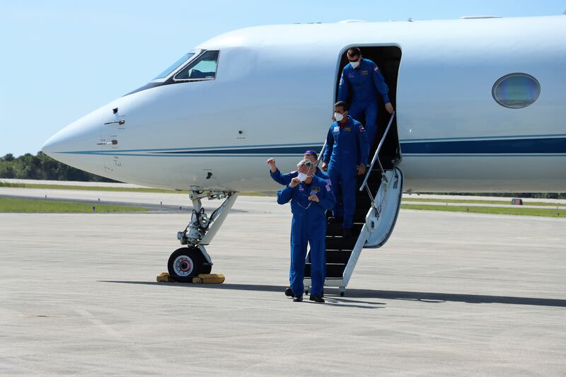 The Crew-6 astronauts disembark a Nasa plane at the Kennedy Space Centre