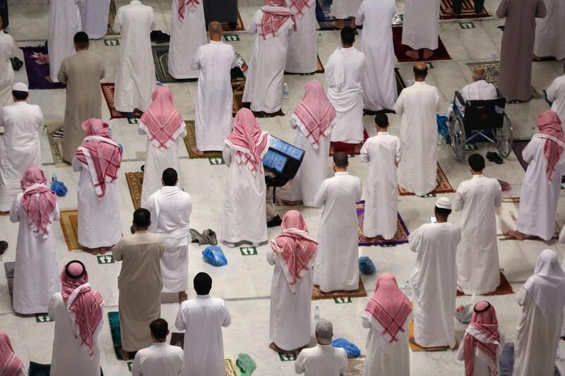 Worshippers perform taraweeh prayers at the Kaaba in the Grand Mosque complex in Makkah. AFP