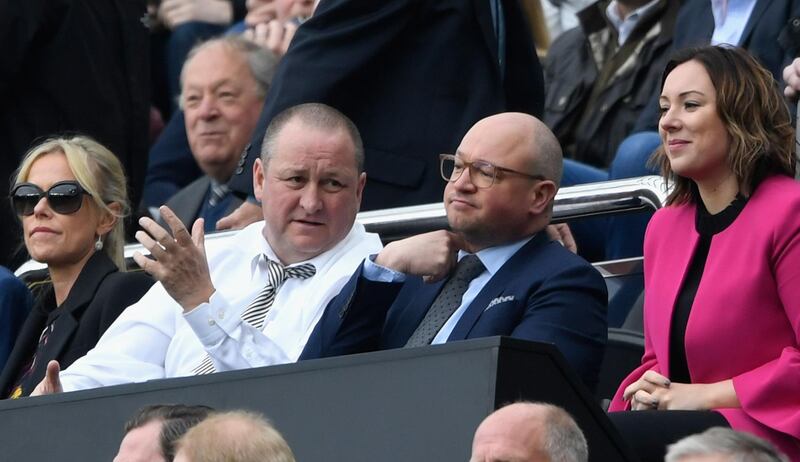 FILE: Premier League club Newcastle United have been put up for sale by owner Mike Ashley NEWCASTLE UPON TYNE, ENGLAND - MAY 07:  Newcastle United owner Mike Ashley (l) and Lee Charnley look on during the Sky Bet Championship title after the match between Newcastle United and Barnsley at St James' Park on May 7, 2017 in Newcastle upon Tyne, England.  (Photo by Stu Forster/Getty Images)