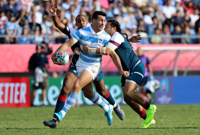 Argentina's Jeronimo de La Fuente looks to pass the ball during the Rugby World Cup Pool C game at Kumagaya Rugby Stadium between Argentina and the United States in Kumagaya City, Japan. AP Photo