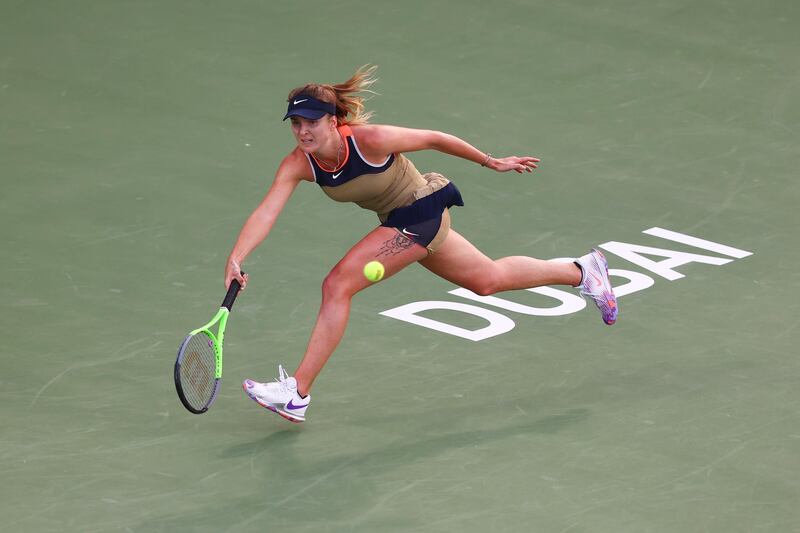 DUBAI, UNITED ARAB EMIRATES - MARCH 09: Elina Svitolina of Ukraine stretches to play a forehand in her Round Two match against Svetlana Kuznetsova of Russia during Day Three of the Dubai Duty Free Tennis Championships at Dubai Duty Free Tennis Stadium on March 09, 2021 in Dubai, United Arab Emirates. (Photo by Francois Nel/Getty Images)