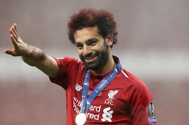 Mohamed Salah will rejoin his Liverpool teammates for the first time since winning the Uefa Champions League at the end of July in France. Reuters 