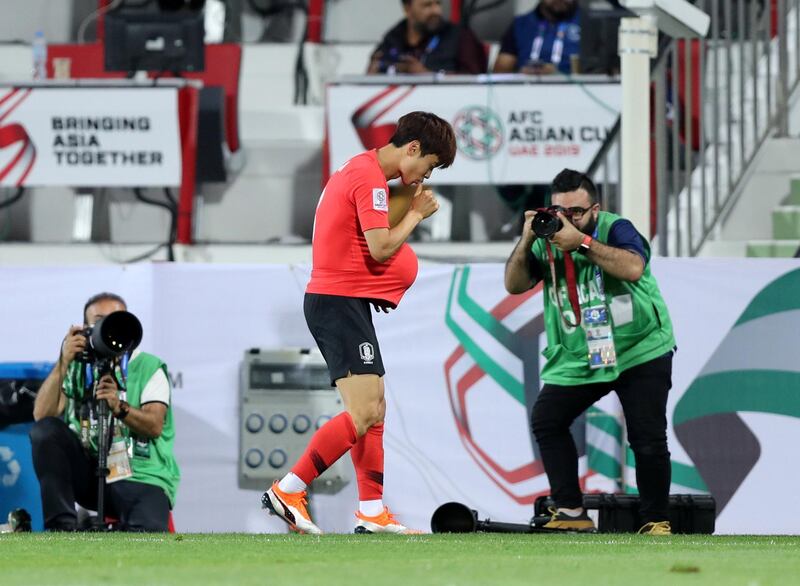 Dubai, United Arab Emirates - January 22, 2019: Kim Jin-su of South Korea scores in the game between South Korea and Bahrain in the Asian Cup 2019. Tuesday, January 22nd, 2019 at Rashid Stadium, Dubai. Chris Whiteoak/The National