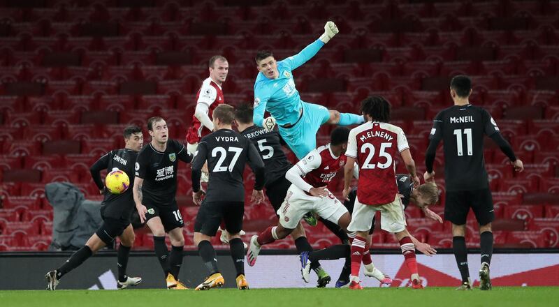 BURNLEY RATINGS: Nick Pope, 7 -- Always alert to an Arsenal side that looked keen to pepper the penalty area with balls into the box. One miscued goal kick put his side in a bit of bother, but an otherwise solid display. PA