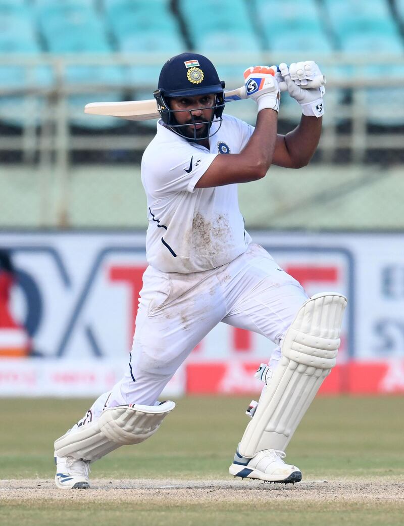 Indian cricketer Rohit Sharma plays a shot during the fourth day's play of the first Test match between India and South Africa at the Dr. Y.S. Rajasekhara Reddy ACA-VDCA Cricket Stadium in Visakhapatnam on October 5, 2019. ----IMAGE RESTRICTED TO EDITORIAL USE - STRICTLY NO COMMERCIAL USE-----
 / AFP / NOAH SEELAM / ----IMAGE RESTRICTED TO EDITORIAL USE - STRICTLY NO COMMERCIAL USE-----
