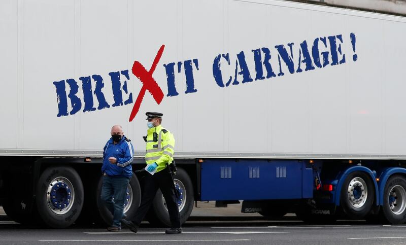 A policeman escorts a driver in London. AP Photo
