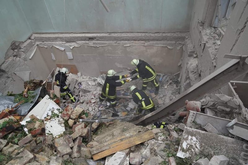 At least four people died when a rocket hit the apartment building. Reuters