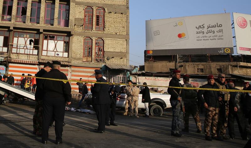 The attack follows a suicide bomb attack near a security checkpoint in Baghdad on Saturday where eight people were killed and ten injured. Sabah Arar / AFP Photo
