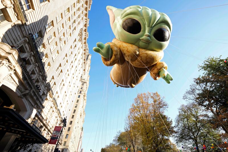 The Grogu or Baby Yoda balloon floats in the Macy's Thanksgiving Day Parade. AP
