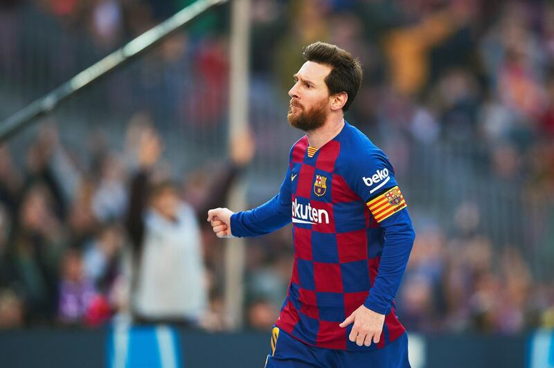 Barcelona striker Lionel Messi celebrates after scoring the second of his goals in a convincing win over Eibar. EPA