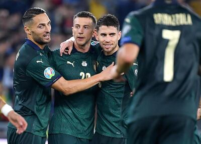 epa07916216 Italy's Federico Bernardeschi (C) celebrates with teammates after scoring 2-0 goal during the UEFA EURO 2020 group J qualifying soccer match between Italy and Greece at the Olimpico Stadium in Rome, Italy, 12 October 2019.  EPA/ETTORE FERRARI