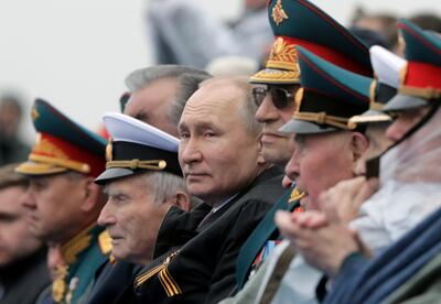 Russian President Vladimir Putin attends a military parade in Red Square in central Moscow. Reuters