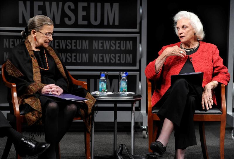 The first female US Supreme Court justice, Sandra Day O'Connor, speaks as fellow Justice Ruth Bader Ginsburg listens during a forum at the Newseum in Washington on April 11, 2012, to mark the 30th anniversary of O'Connor's first term on the Supreme Court. Reuters