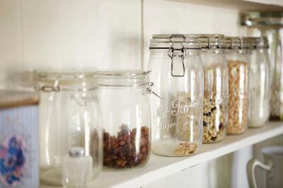 Jars of dried foods on shelf. Getty Images