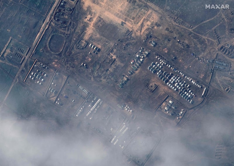 A satellite image released by Maxar Technologies reportedly shows Russian ground forces deployed at the Opuk Training Area on December 22, 2021. AFP