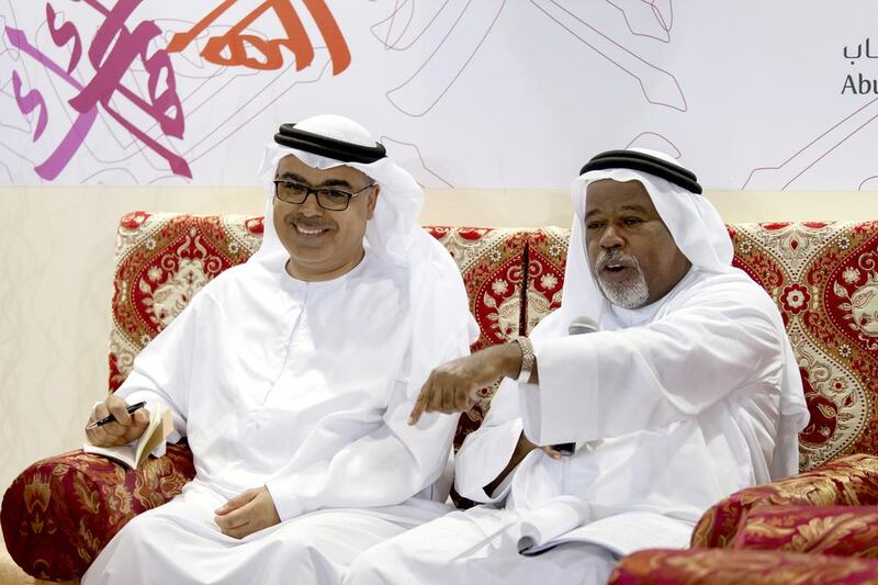 A Majlis Al Mutanabi session on The Sea in the Emirati Memory featuring Bilal Al Budoor, right, and Abdelaziz Al Musallam. Viktoryia Vinnikava for The National