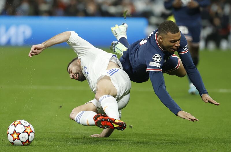 Real Dani Carvajal in action against Kylian Mbappe. EPA