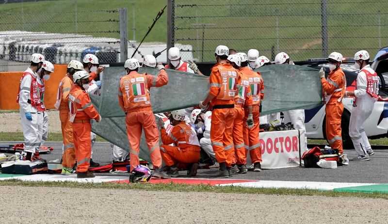 PruestelGP's Jason Dupasquier receives medical attention after his crash at Mugello on Saturday. Reuters