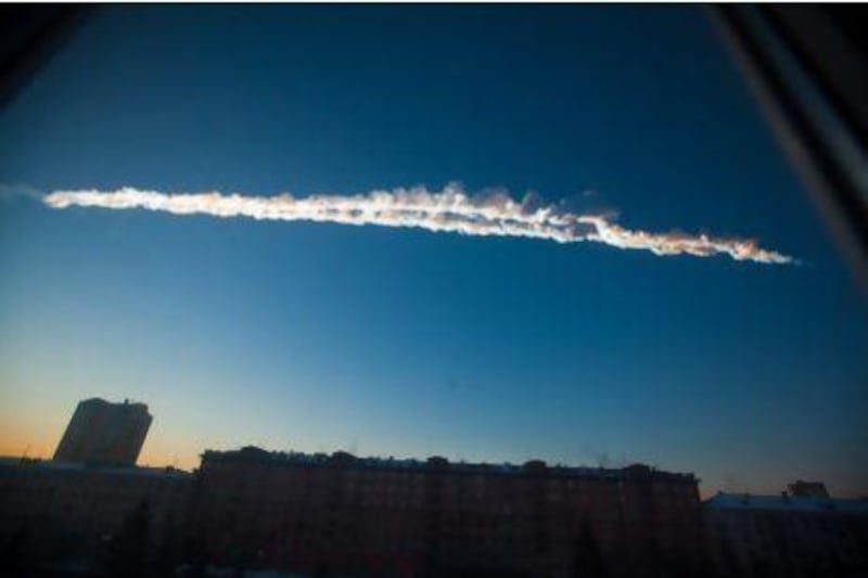 A meteor streaks across the sky of Russia's Ural Mountains on Friday morning, its shockwaves injuring about 1,000 people, including many hurt by broken glass.