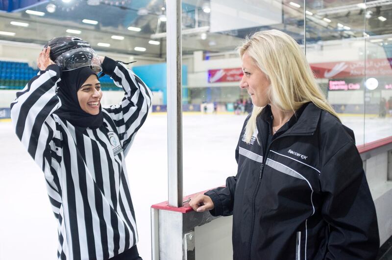 ABU DHABI, UNITED ARAB EMIRATES, OCTOBER 8, 2015. Joy Johnston, right, Emirates Hockey LeagueÕs (EHL) chief of games officials, with Fatima Al Ali, Referee in the EHL. Photo: Reem Mohammed.(Reporter: Amith Passela  / Section: SP) *** Local Caption ***  RM_20151008_HOCKEY_10.JPG