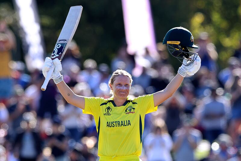 Alyssa Healy celebrates making her century against England during the final of the Women's Cricket World Cup. AP