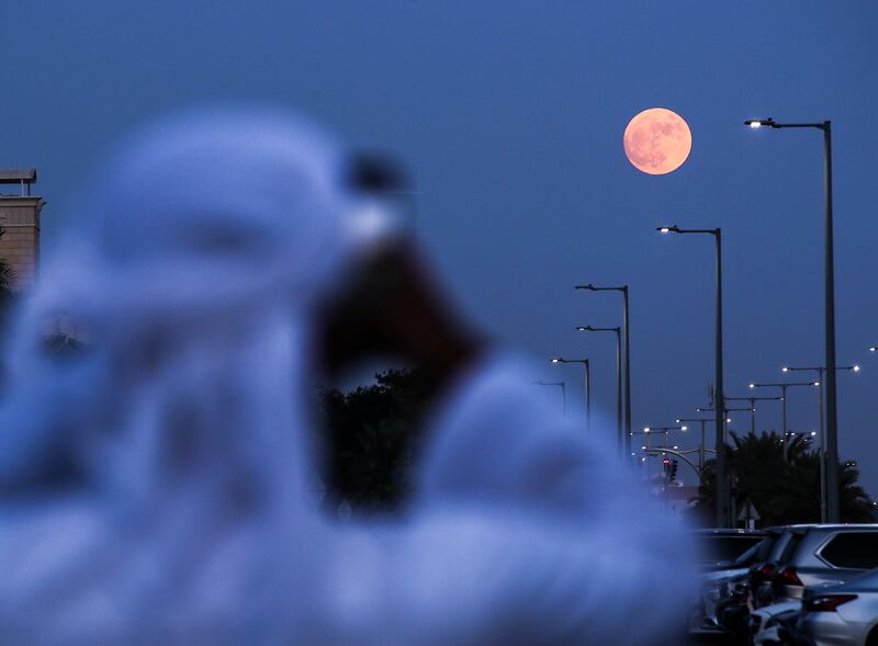 The moon rises in Abu Dhabi's Al Qana area. Victor Besa / The National