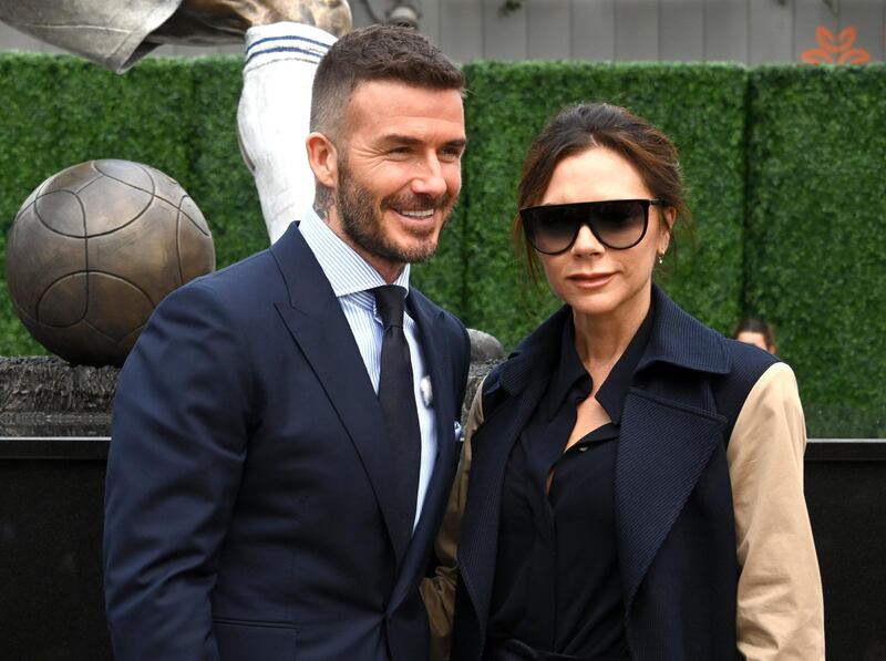 David and Victoria Beckham pose during unveiling of the statue. Kirby Lee / USA TODAY Sports / Reuters