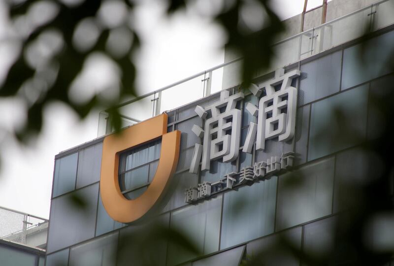 FILE PHOTO: Logo of Didi Chuxing is seen at its headquarters building in Beijing, China August 28, 2018. REUTERS/Jason Lee/File Photo