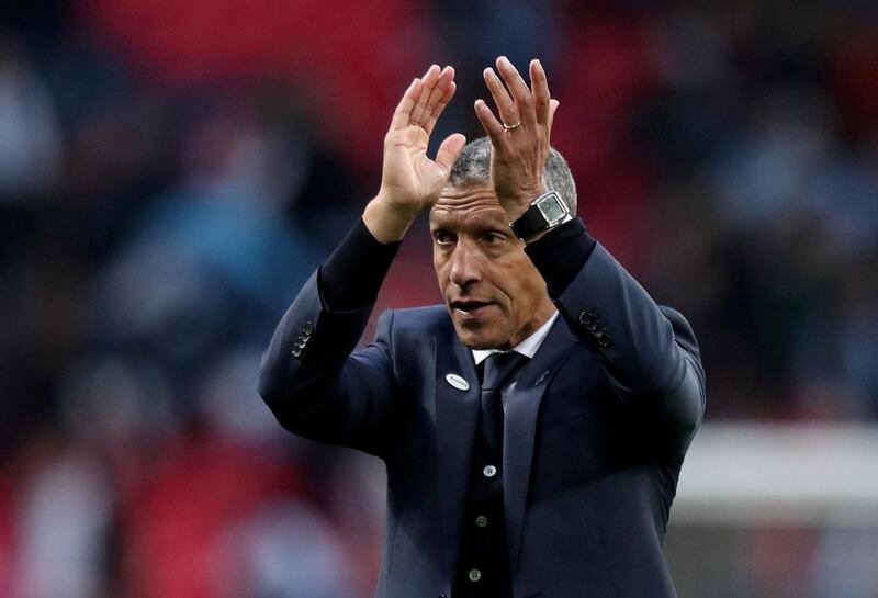 FILE PHOTO: Soccer Football - FA Cup Semi Final - Manchester City v Brighton & Hove Albion - Wembley Stadium, London, Britain - April 6, 2019  Brighton manager Chris Hughton applauds fans after the match              REUTERS/Jon Super/File Photo