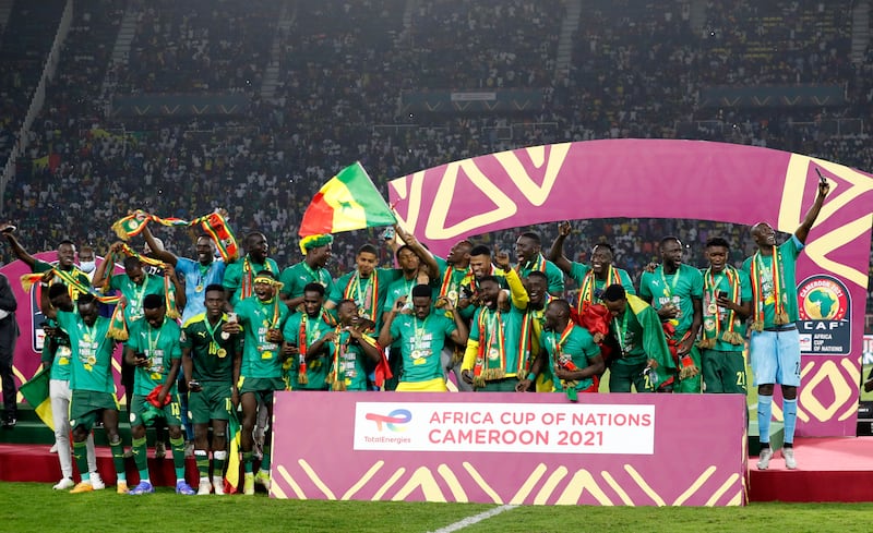 Senegal players celebrate after winning the Africa Cup of Nations. Reuters