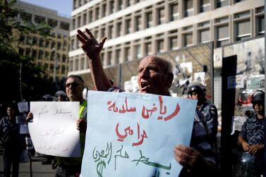 A protester at a demonstration outside of Lebanon Central Bank during ongoing anti-government protests in Beirut. Reuters